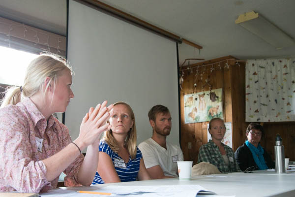 Organizer Sarah Berquist addresses the panelists and attendees.